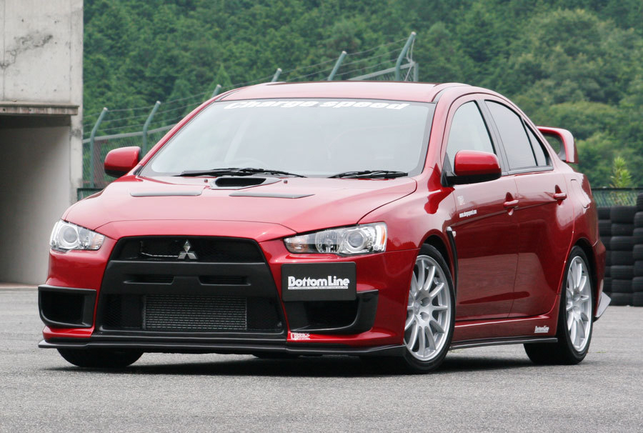 Just maybe put this bodykit on another Evo color cause this Evo red somehow